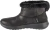 A side view of a black Skechers boot with faux fur trim. Voir les images du produit