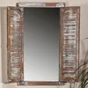 A mirror with wooden shutter-style frames. Anteprima dell’immagine prodotto