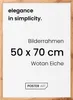 A product image of a picture frame with text overlay. Produktbild-Vorschau