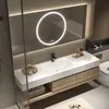 A modern bathroom vanity with a sink, faucet, mirror, and storage. Anteprima dell’immagine prodotto