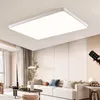 A modern living room with a large rectangular LED ceiling light. Produktbild-Vorschau