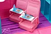 Interior of a toy airplane with pink seats and trays with food. Produktbild-Vorschau