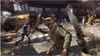 A group of people fighting with melee weapons in a post-apocalyptic setting. Produktbild-Vorschau
