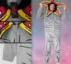 A collage of images showing a man wearing a Stranger Things Demogorgon costume onesie. The collage includes close-ups of the onesie's details and a full shot of the man wearing it. Náhľad obrázku produktu
