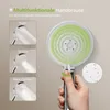A hand holding a multifunctional shower head with different spray modes illustrated. Anteprima dell’immagine prodotto