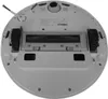 The underside of a white robot vacuum cleaner. Voir les images du produit