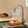 A water filter attached to a kitchen faucet, with fruits and vegetables in the foreground. Produktbild-Vorschau