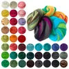 A collection of colorful wool roving arranged in rows and a cluster. Produktbild-Vorschau