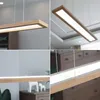 Collage of images showing a wooden LED pendant light from different angles and in different settings. Náhled obrázku produktu