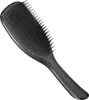 A black hairbrush is shown against a white background. Produktbild-Vorschau
