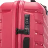 A close-up of a pink suitcase showing the combination lock and zipper. Náhľad obrázku produktu