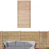 A wooden fence panel is shown above a section of fence with a sofa in front of it. Produktbild-Vorschau