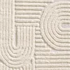 A close-up view of a textured rug with a geometric pattern. Podgląd zdjęcia produktu