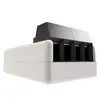 A 3D render of a white and black smart home device with multiple input slots. Anteprima dell’immagine prodotto