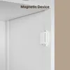 Close-up of a white cabinet door with a magnetic catch attached. Náhled obrázku produktu
