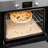 A quiche is baking in an oven on a baking sheet. Náhled obrázku produktu