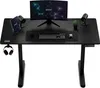 A black gaming desk with a monitor, keyboard, mouse, tablet, speakers, and headphones. Anteprima dell’immagine prodotto