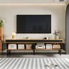A modern living room with a TV stand and a large television mounted above it. Produktbild-Vorschau