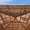 The underside of a gazebo roof structure against a blue sky. Produktbild-Vorschau