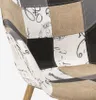 Close-up of a patchwork chair. Voir les images du produit