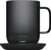 A black Ember mug is shown on its charging coaster. Náhled obrázku produktu