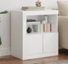 A white sideboard with two doors and open shelving, decorated with books and decorative items. Voir les images du produit