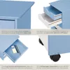 Collage of four close-up shots of a blue and white wooden roll container, highlighting its features and construction. Produktbild-Vorschau