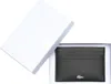A black leather cardholder is presented in a white box. Produktbild-Vorschau