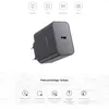 A black USB-C charger is shown at an angle against a white and light gray background, with icons and text describing its features. Produktbild-Vorschau