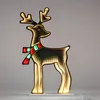 A lit-up reindeer decoration with a scarf. Anteprima dell’immagine prodotto