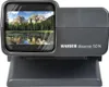 A close-up of a Kaiser Diascop 50 N slide projector, displaying a scenic mountain landscape on its screen. Podgląd zdjęcia produktu