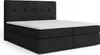 A black boxspring bed with a white mattress and topper, shown from a slightly elevated side angle against a white background. Produktbild-Vorschau