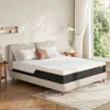 A mattress is displayed on a bed frame in a bedroom setting. Produktbild-Vorschau