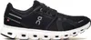 A side view of a black and white running shoe. Anteprima dell’immagine prodotto