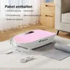 A pink and white vibration plate is shown on a rug in a room, with a yoga mat and accessories nearby. Text lists package contents. Produktbild-Vorschau