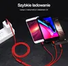 A red charging cable with multiple connectors is shown charging three smartphones plugged into a white power adapter. Anteprima dell’immagine prodotto