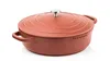 A red cast iron pot with a lid and silver knob, shown from a side angle on a white background. Produktbild-Vorschau