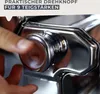 A close-up shot of a finger adjusting a dial on a stainless steel pasta maker. Anteprima dell’immagine prodotto