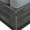 A close-up view of the corner of a grey woven outdoor furniture set, showing the texture of the rope and the grey cushions. Anteprima dell’immagine prodotto