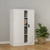 A white metal filing cabinet with one door ajar, revealing shelves with files and clear storage bins. A potted plant sits to the right of the cabinet. Produktbild-Vorschau