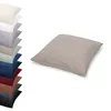A stack of pillowcases in various colors is shown on the left, with a single taupe pillowcase prominently displayed on the right. Produktbild-Vorschau