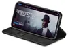 A black flip case for an iPhone, showing the phone screen displaying a movie poster for 'The Inspector'. Produktbild-Vorschau