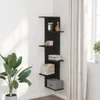 A black corner shelf unit is mounted on a white wall next to a window with white curtains. A large potted plant is on the left side of the image. Náhled obrázku produktu