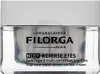 A close-up studio shot of a Filorga NCEF-Reverse Eyes cream jar. Anteprima dell’immagine prodotto