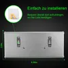 The back of a silver rectangular device with mounting brackets, showing dimensions and installation instructions in German. Produktbild-Vorschau