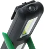 Close-up of a black and green work light with a bright LED panel. Produktbild-Vorschau