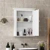 A white medicine cabinet with its door open, displaying various toiletries and cosmetic products on shelves. The cabinet is mounted on a tiled wall in a bathroom setting, with a sink and faucet visible below. Anteprima dell’immagine prodotto
