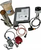 A collection of items for an electric smoking chamber, including wood chips, a smoke generator, a control unit, and various cables and accessories, laid out on a white background. Náhled obrázku produktu