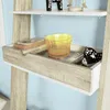 A close-up view of a shelf with books, a yellow container, and decorative items. Podgląd zdjęcia produktu