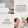 A collage of images showing a fitted sheet being put on a bed, text describing product features, and a couple playfully pillow fighting in bed. Produktbild-Vorschau